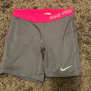 grey nike pros with pink waistband